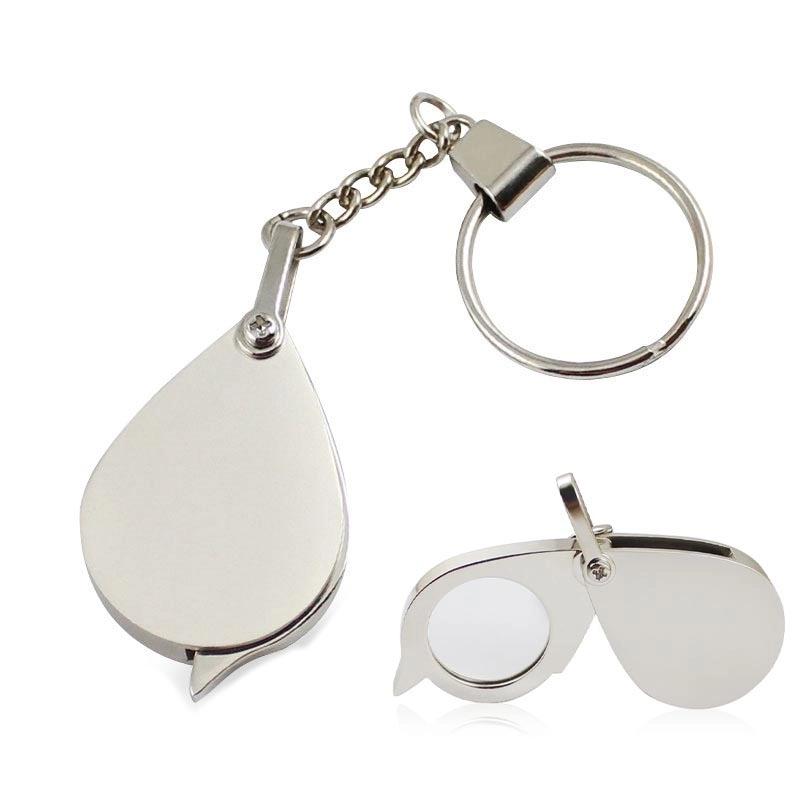308762352.jpg 10X Folding Magnifier with Key Chain - Image 1