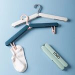 Plastic folding hanger