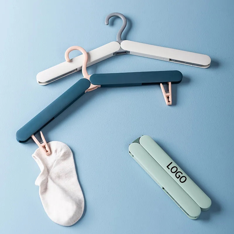 324554114.jpg Plastic folding hanger - Image 1